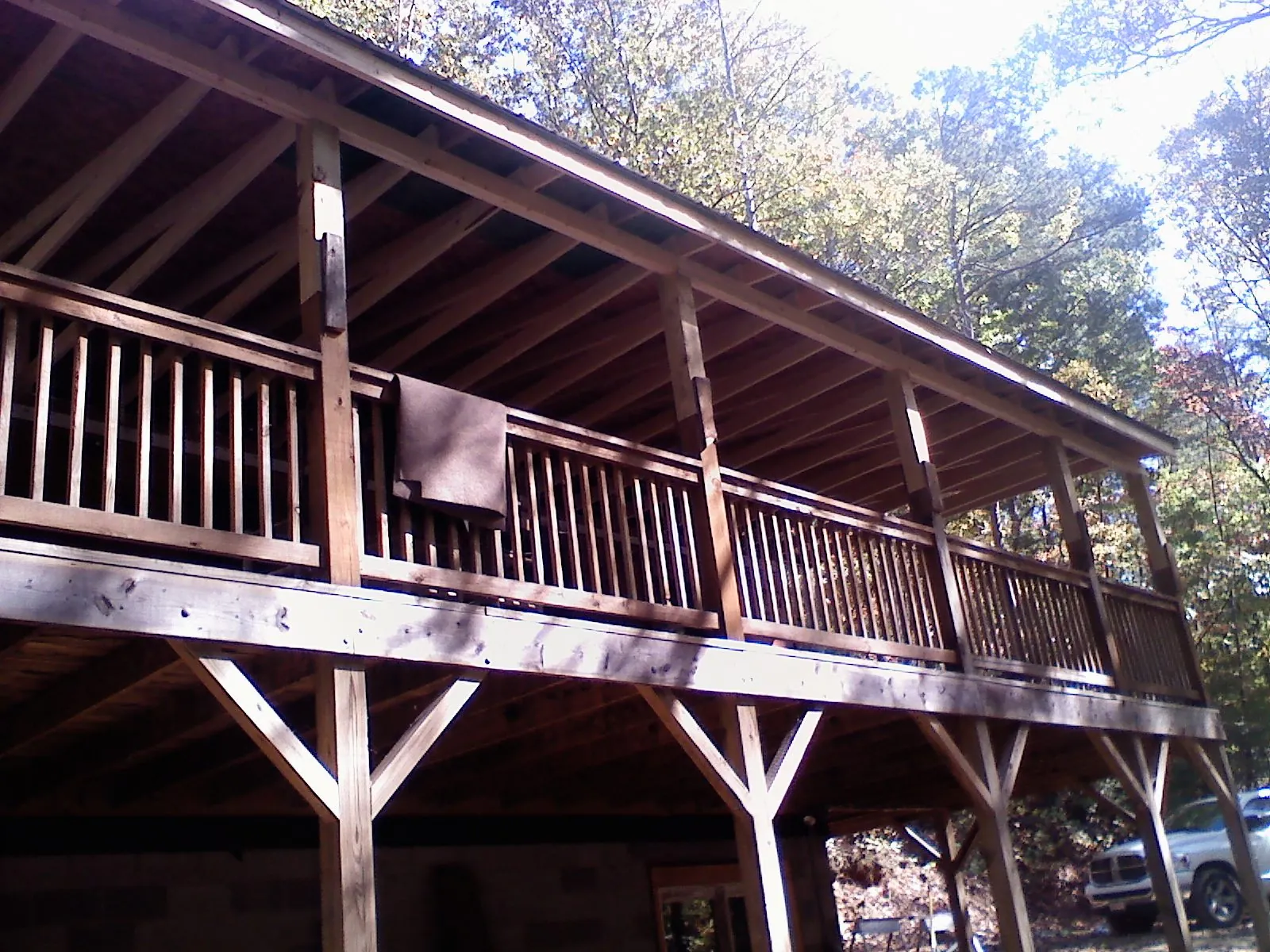 Timber framing under a new elevated porch and deck — Roof Leak Repair in Cumberland Center by Roofing Brothers